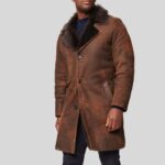 Men's distressed leather trench coat in brown with faux fur lining.
