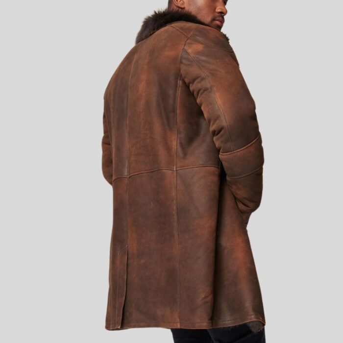 Vintage-inspired men's distressed leather trench coat with warm faux fur lining.